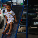 Boy playing in Klong Toey Slum