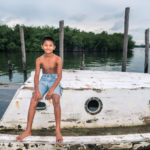 caye-caulker-boy-on-boat-6105