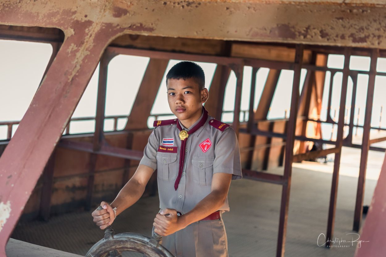 Teen Thai Scout on Abandoned River Boat - Christopher Ryan
