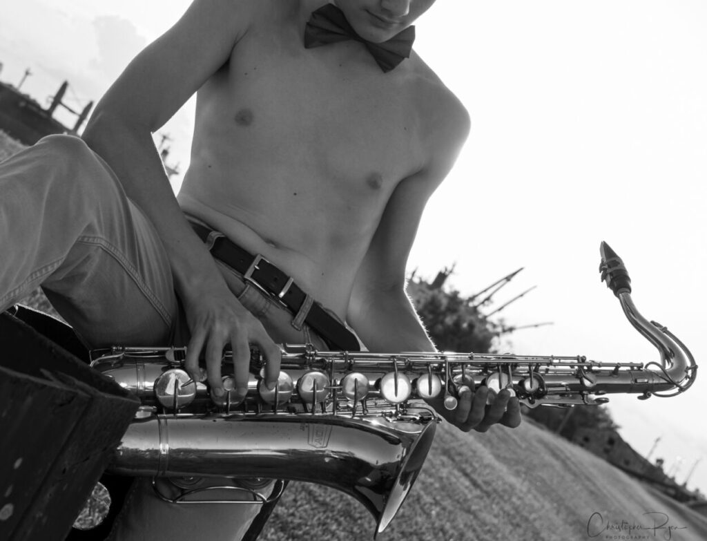 saxophone player shirtless bowtie