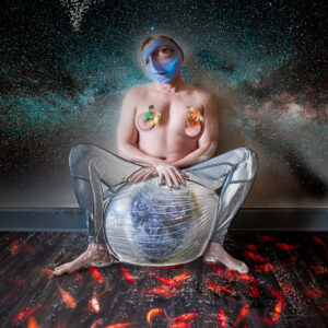 Surreal digital composite self-portrait of photographer Christopher Ryan sitting amidst swimming koi fish under a starry galaxy background.